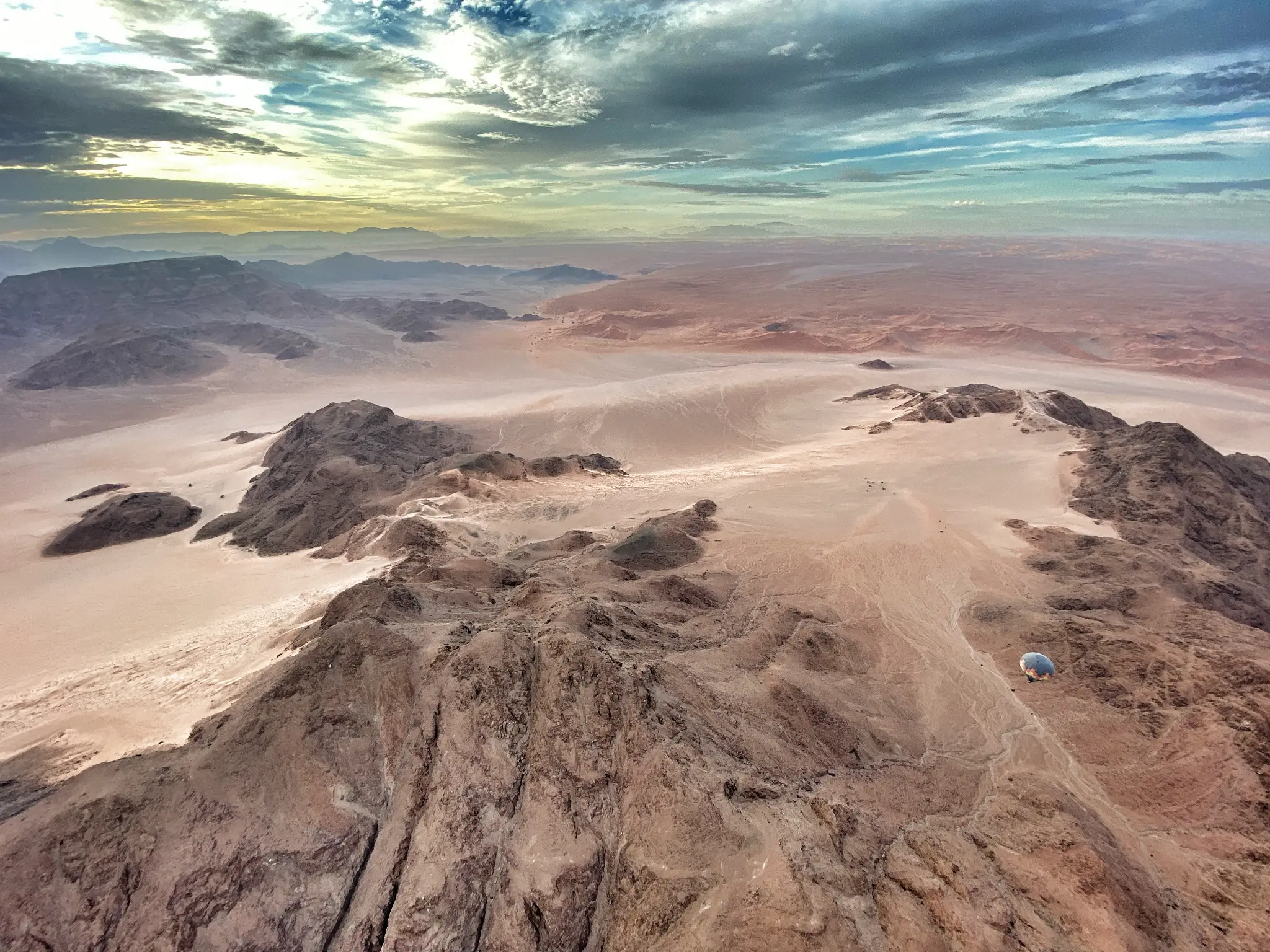 Hot air balloon over Namibian landscape